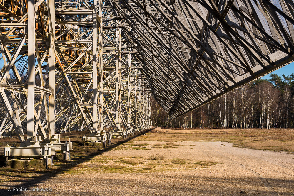 A view from underneath the primary mirror of the Nançay Radio Telescope showing its steel support structure.